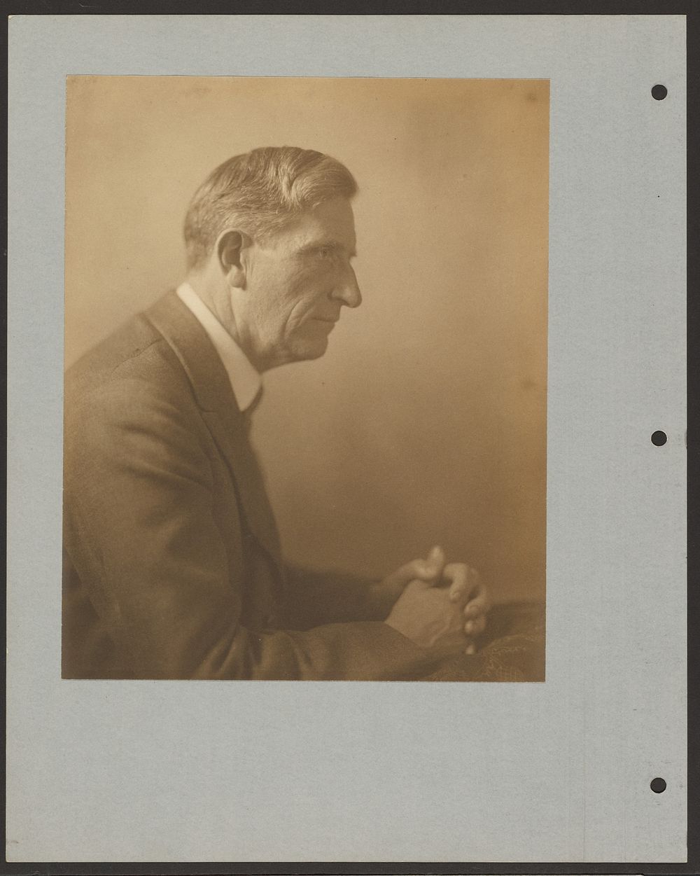 Portrait of a Man with Clasped Hands by Louis Fleckenstein
