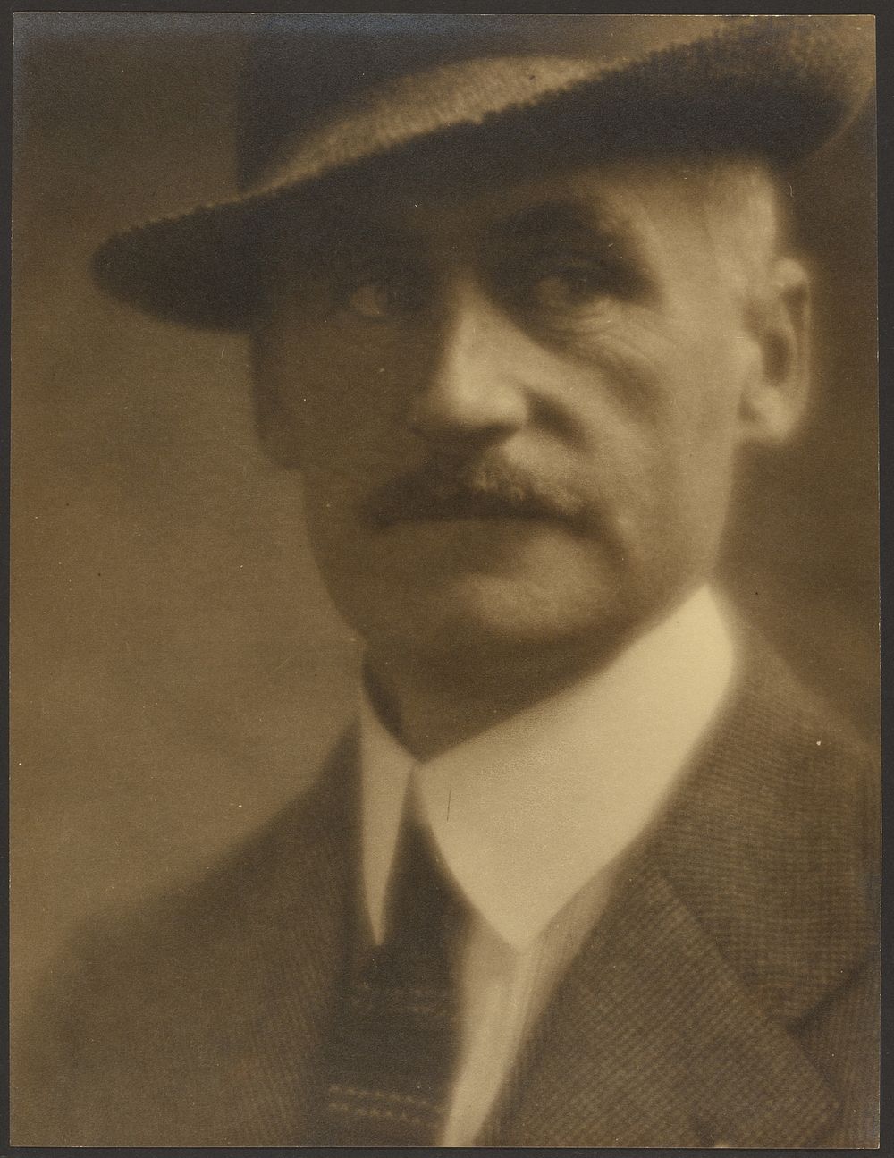 Portrait of a Man with Straw Hat by Louis Fleckenstein