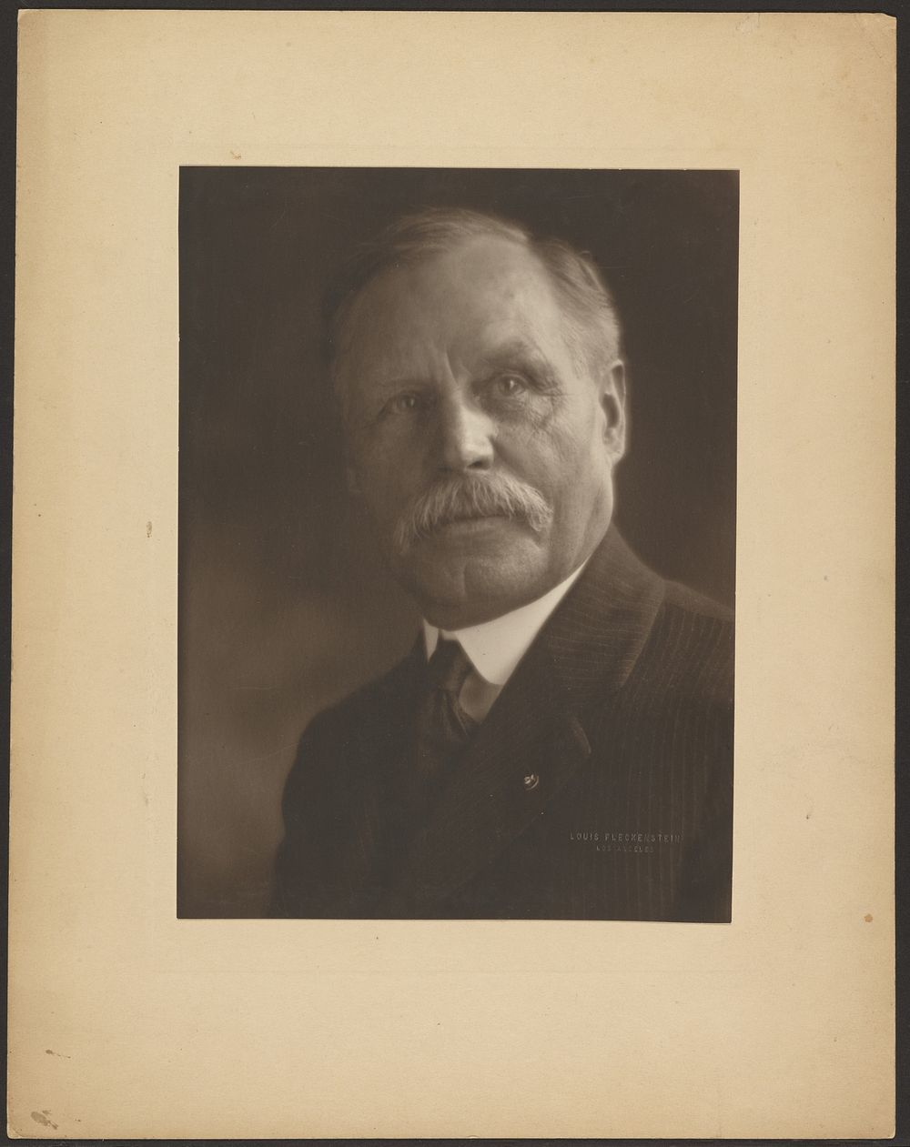 Portrait of a Man with Metal Lapel Pin by Louis Fleckenstein