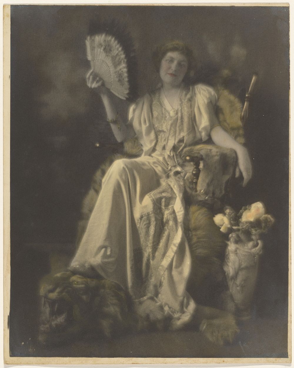 Florence Seated in a Chair with Tiger Rug by Louis Fleckenstein