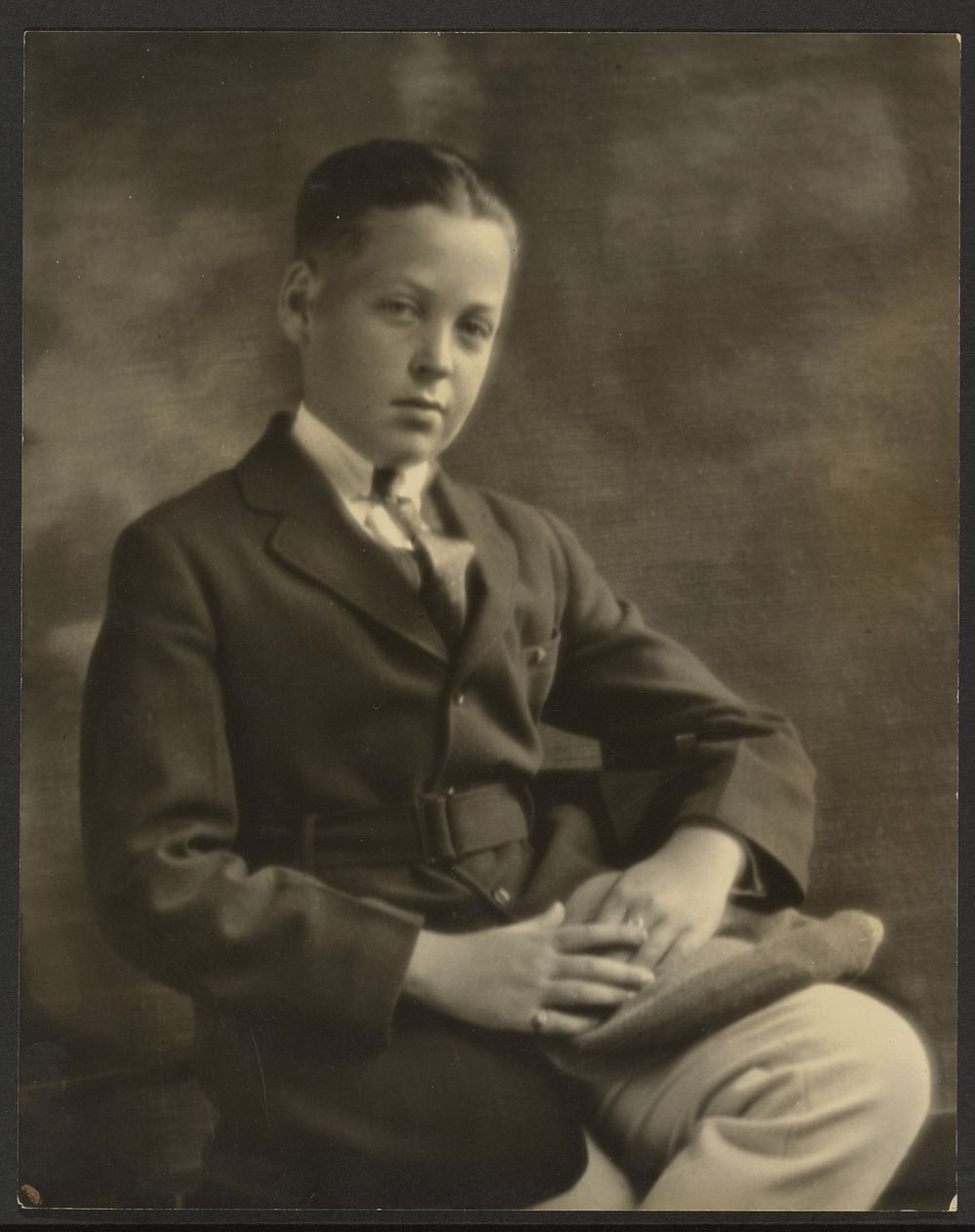 Portrait of a Boy with Cap on Knee by Louis Fleckenstein
