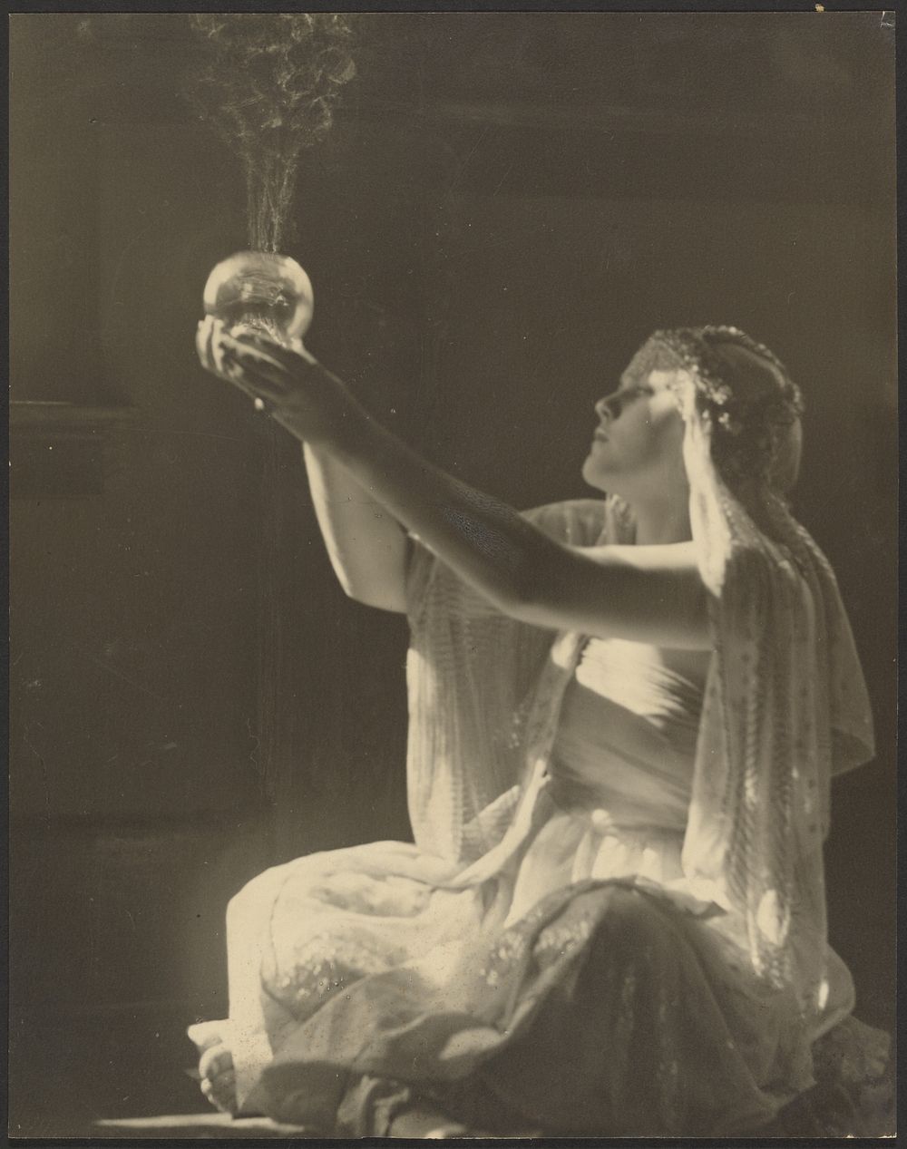 Costumed Woman Holding a Glass Incense Burner by Louis Fleckenstein