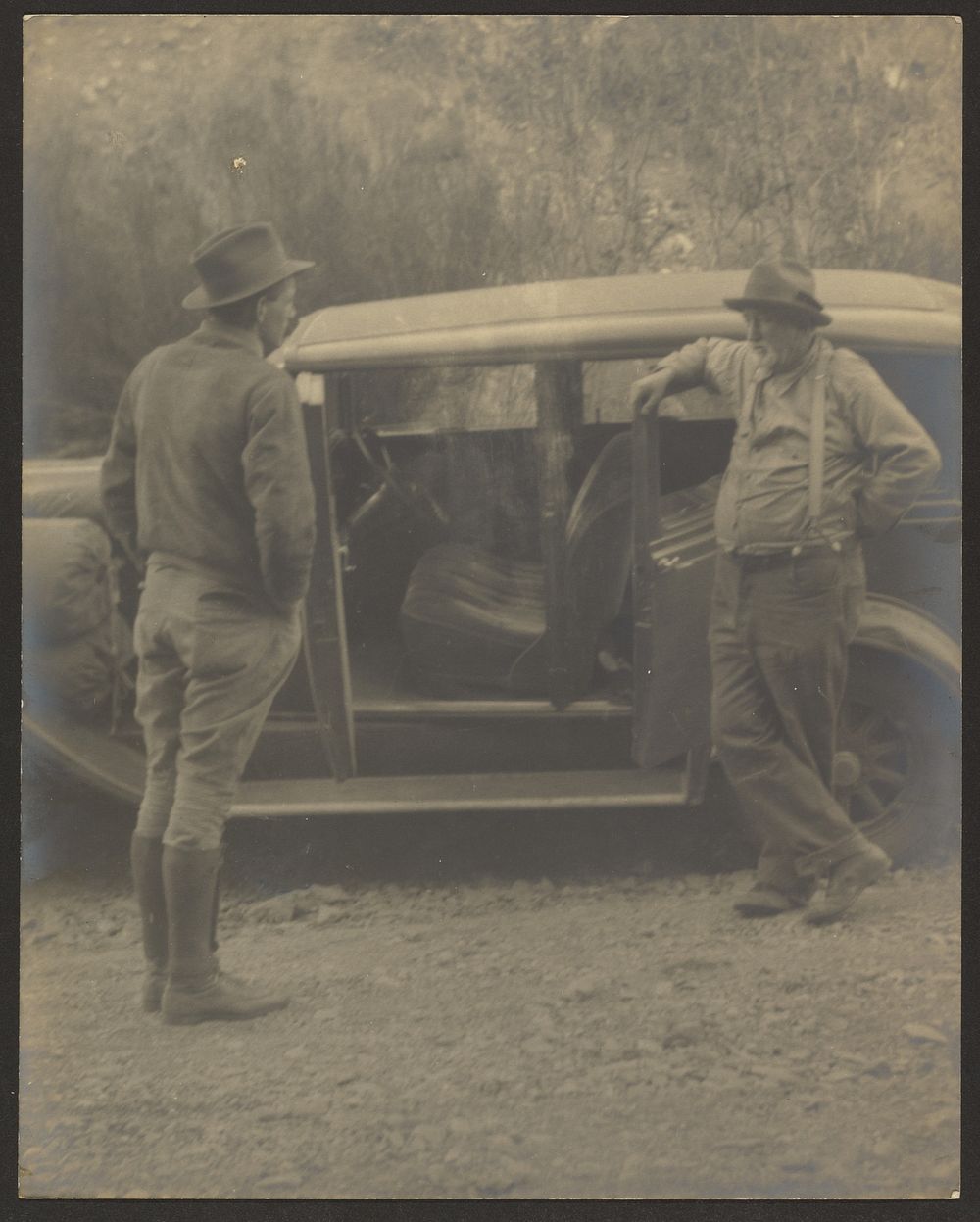 Two Men in Front of a Car by Louis Fleckenstein