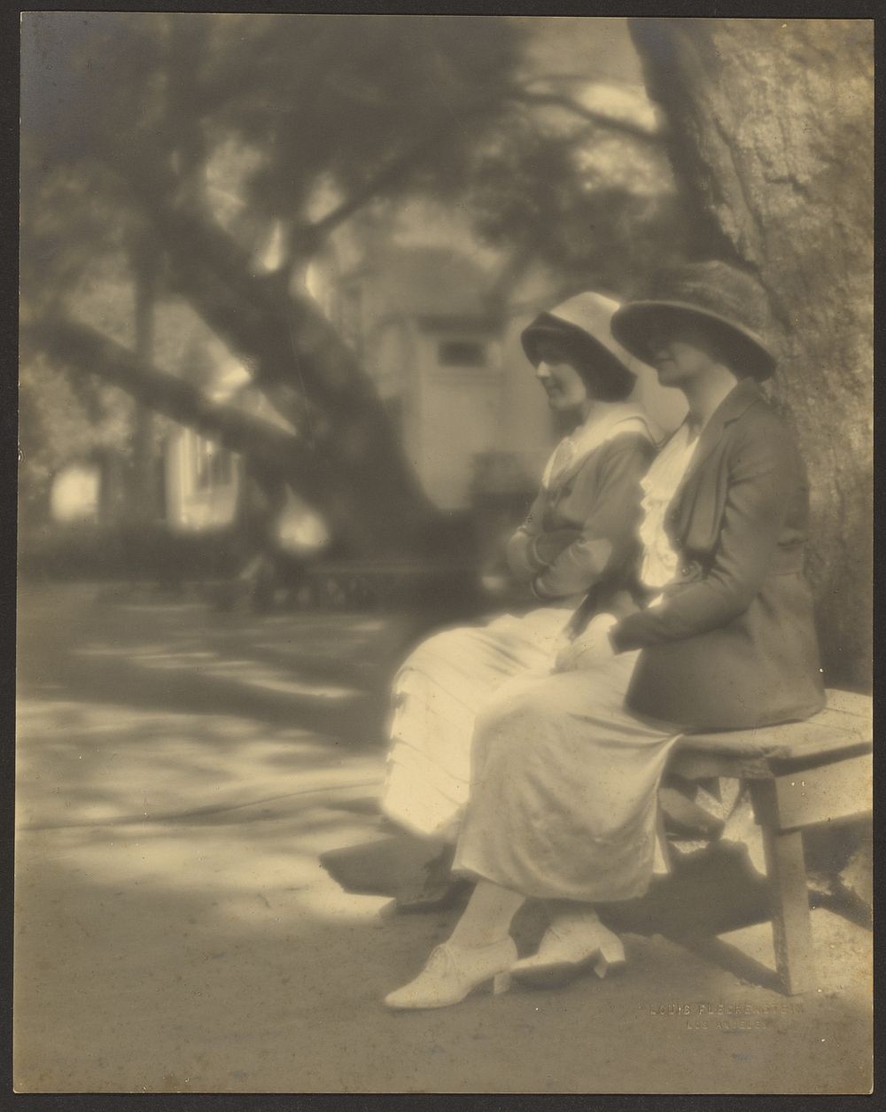 Two Women Seated on a Bench by Louis Fleckenstein