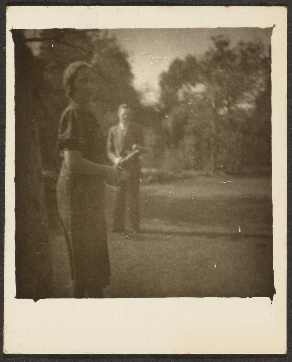 Woman and Man in Park by Louis Fleckenstein