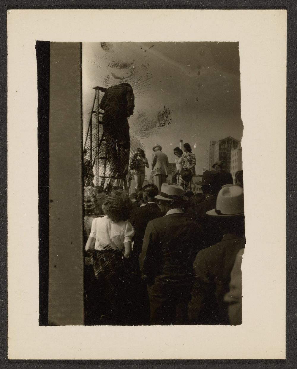 Crowd with Man on Ladder by Louis Fleckenstein