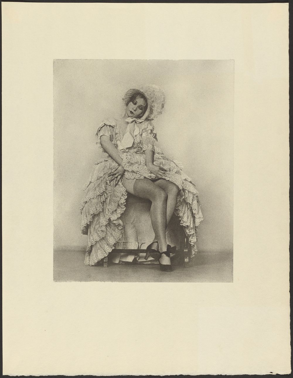 Seated Woman in a Ruffled Dress with Coquettish Facial Expression by Arthur F Kales
