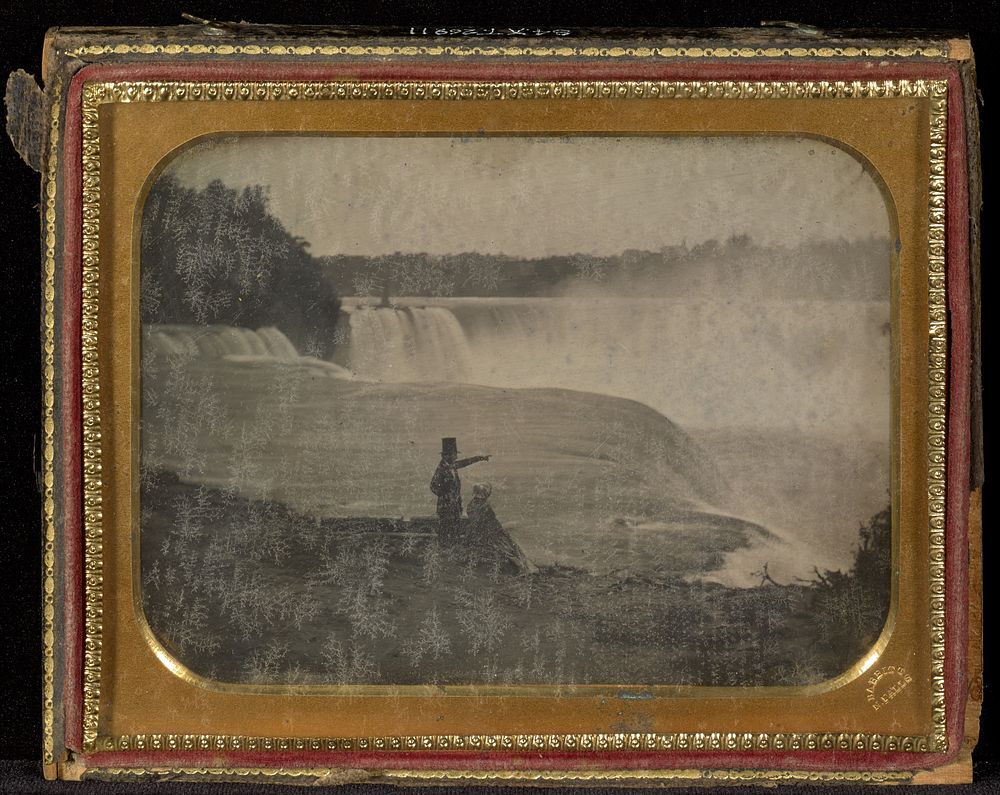 Niagara Falls with couple in foreground by Platt D Babbitt