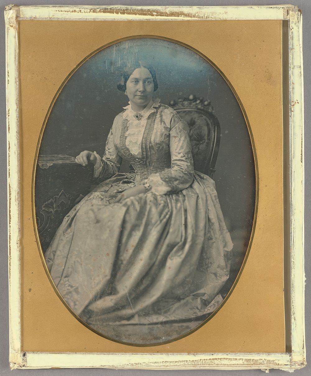 Portrait of a Seated Woman in Long, Flowing Dress