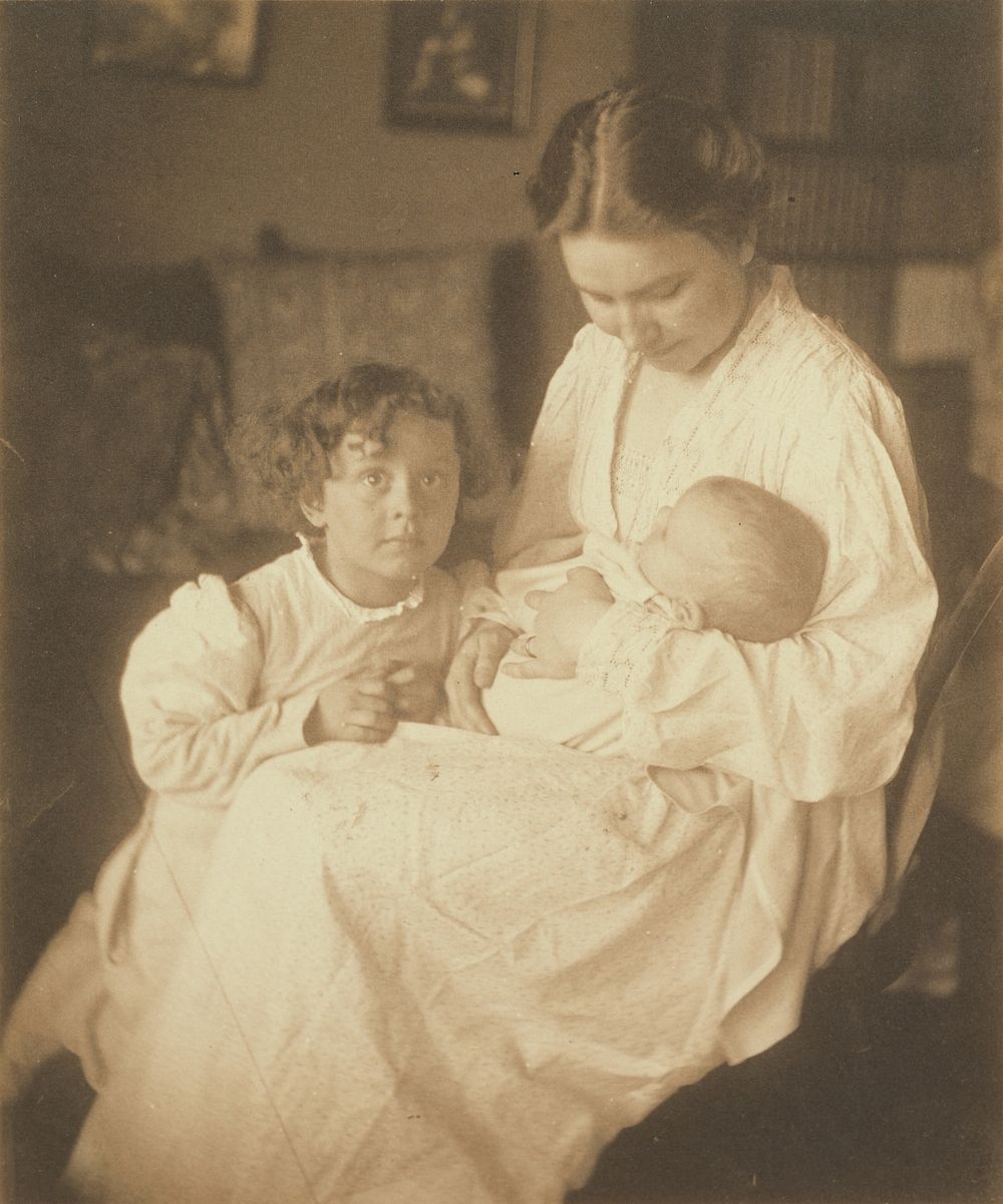 Mother in dressing gown, seated, with infant and small son by Gertrude Käsebier