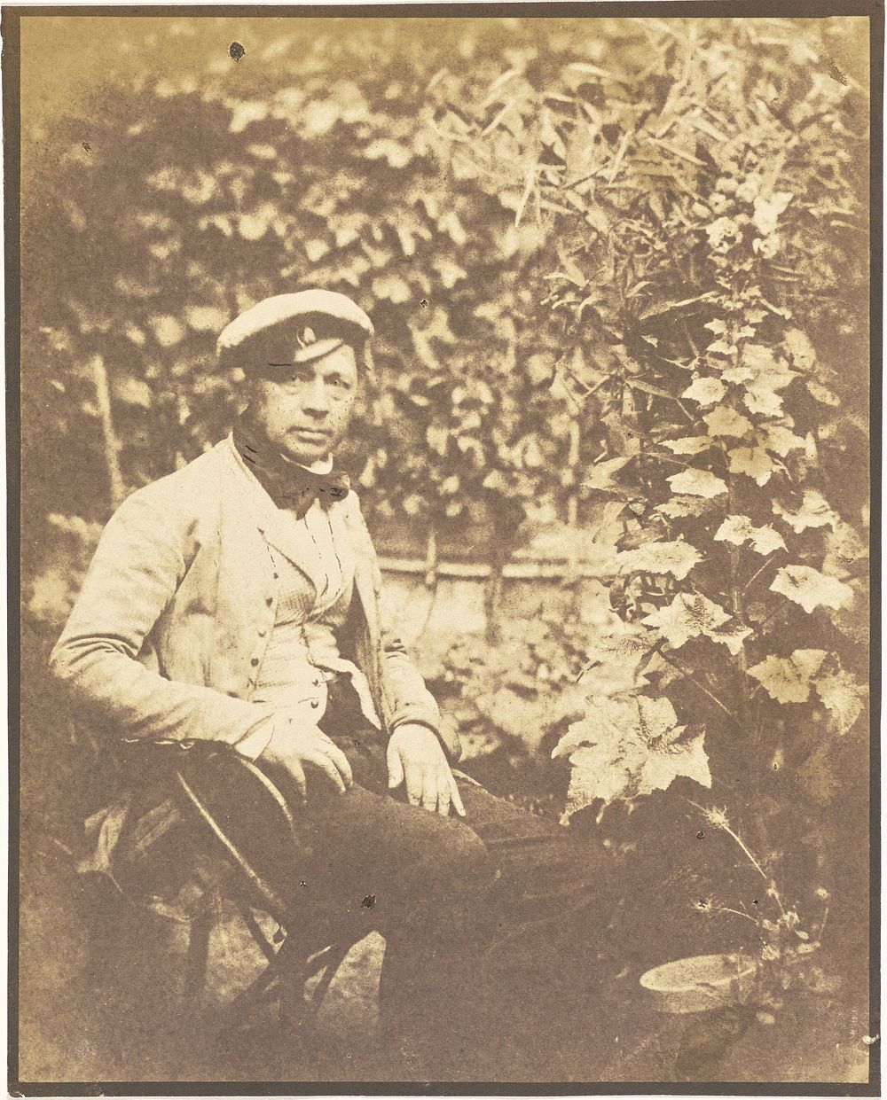 Self-portrait in garden by Hippolyte Bayard