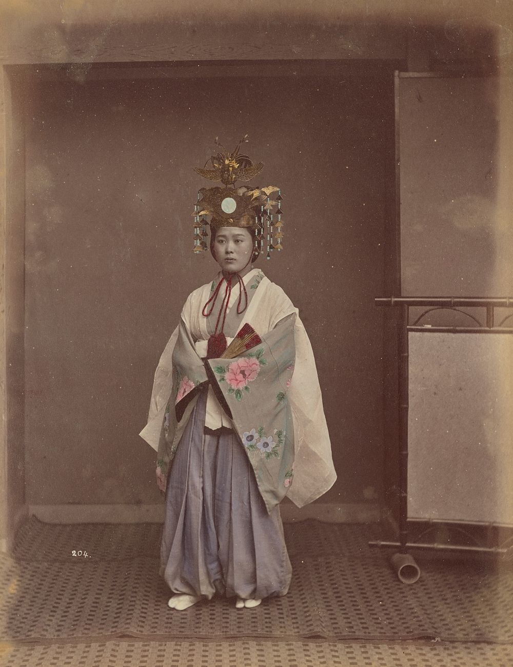 Woman in Headdress by Kusakabe Kimbei