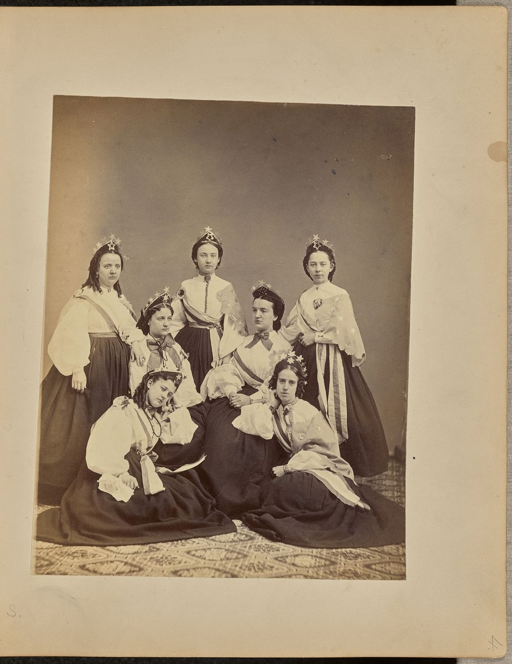 Group portrait of women in crowns and sashes by Jordan H Abbott