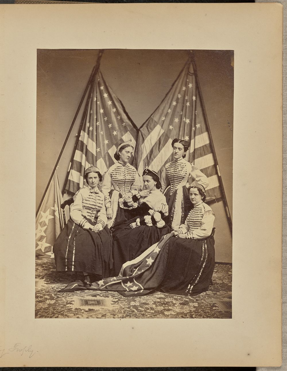 Group of women in front of American flags by Churchill and Denison