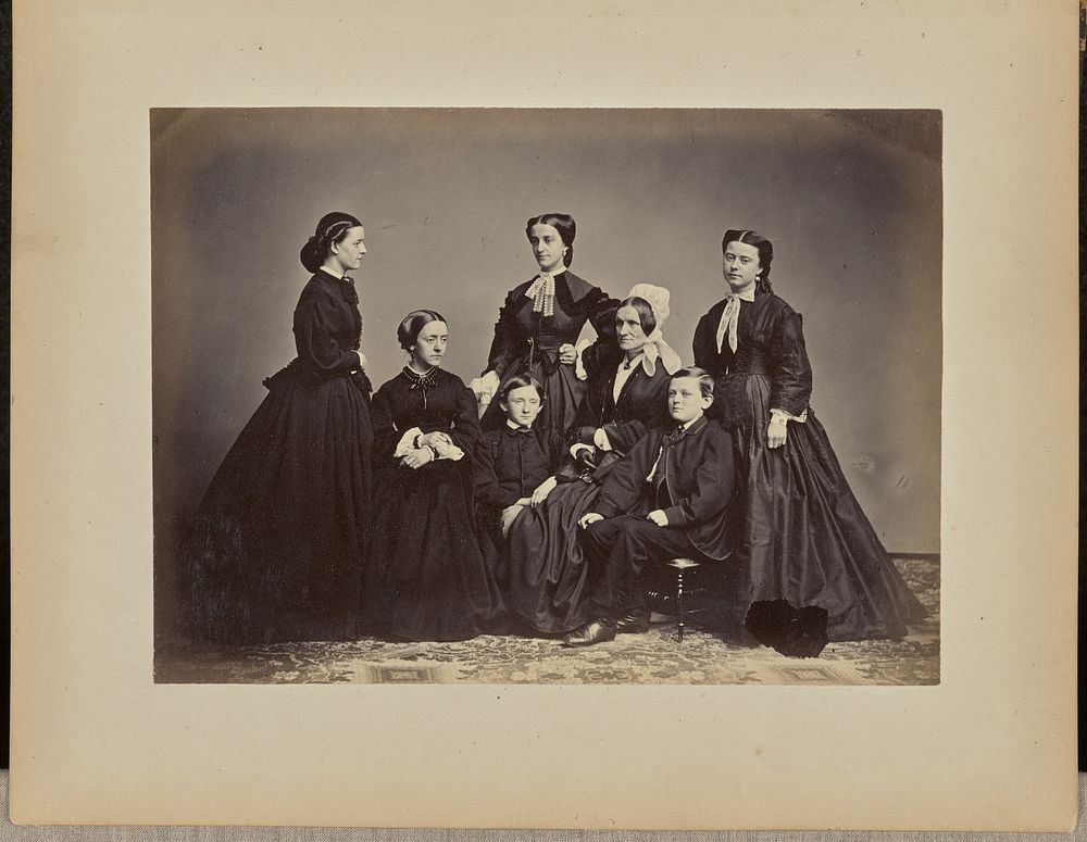 Group portrait of women and boy by Churchill and Denison