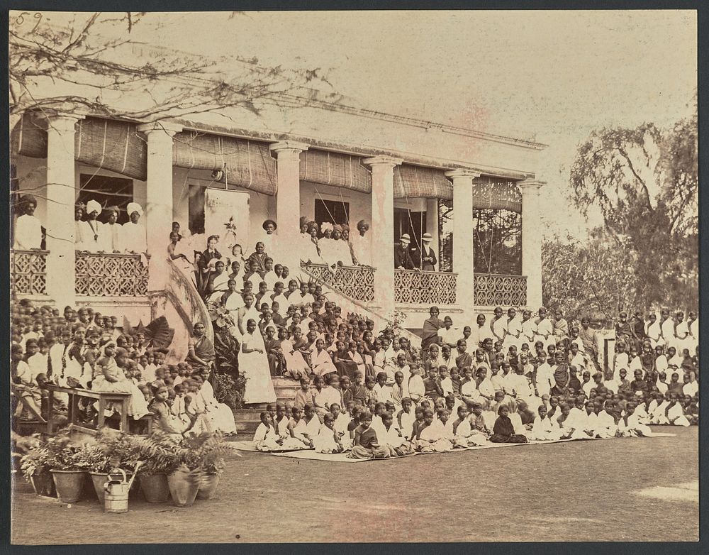 Group portrait of students and school staff, India