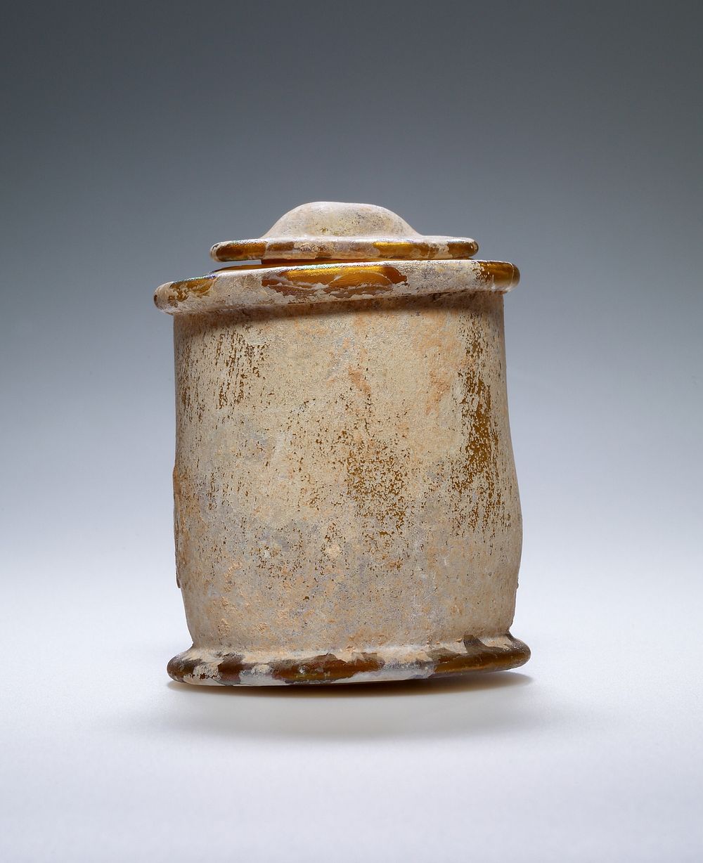 Amber-colored Pyxis with lid