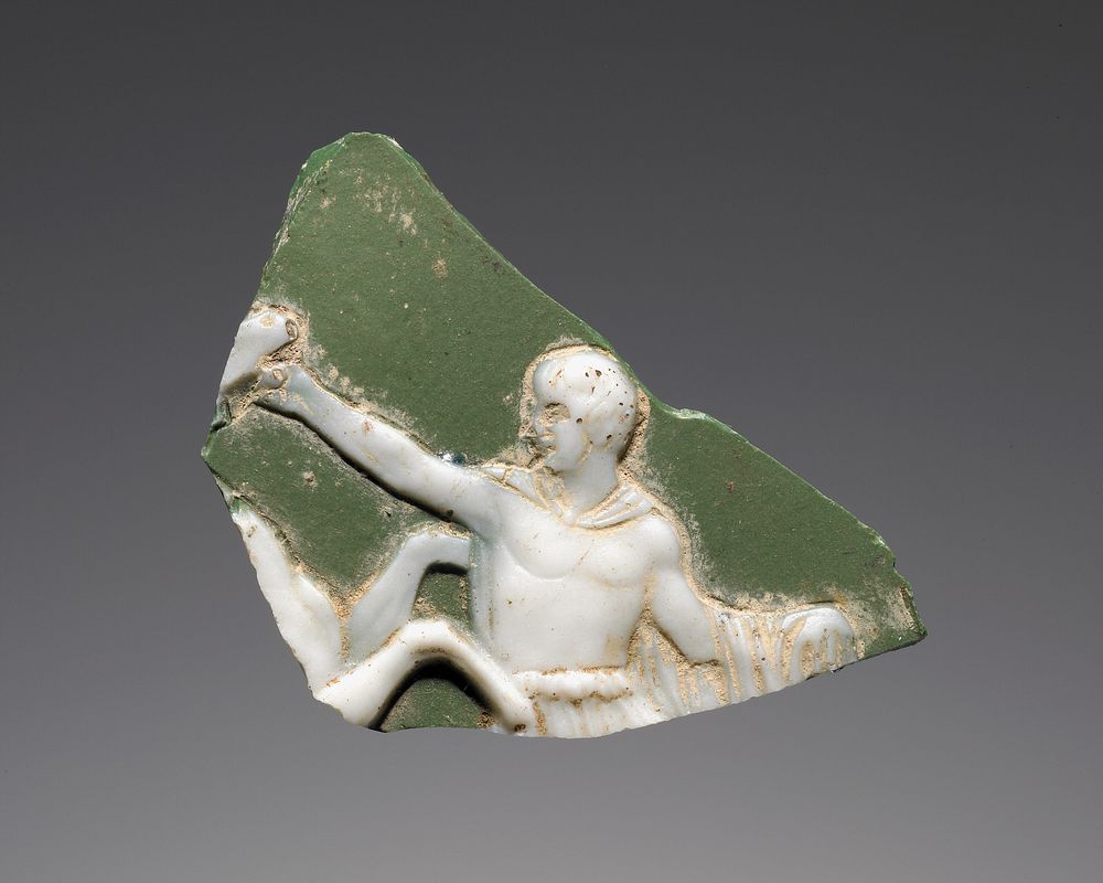 Plaque (?) Fragment with a Man Holding the Bridle of a Horse