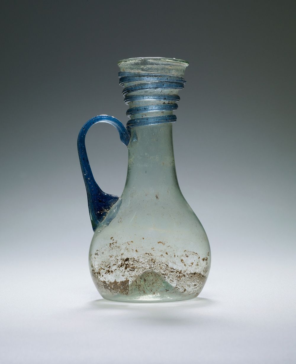 Pale Green Pitcher with blue trail and handle