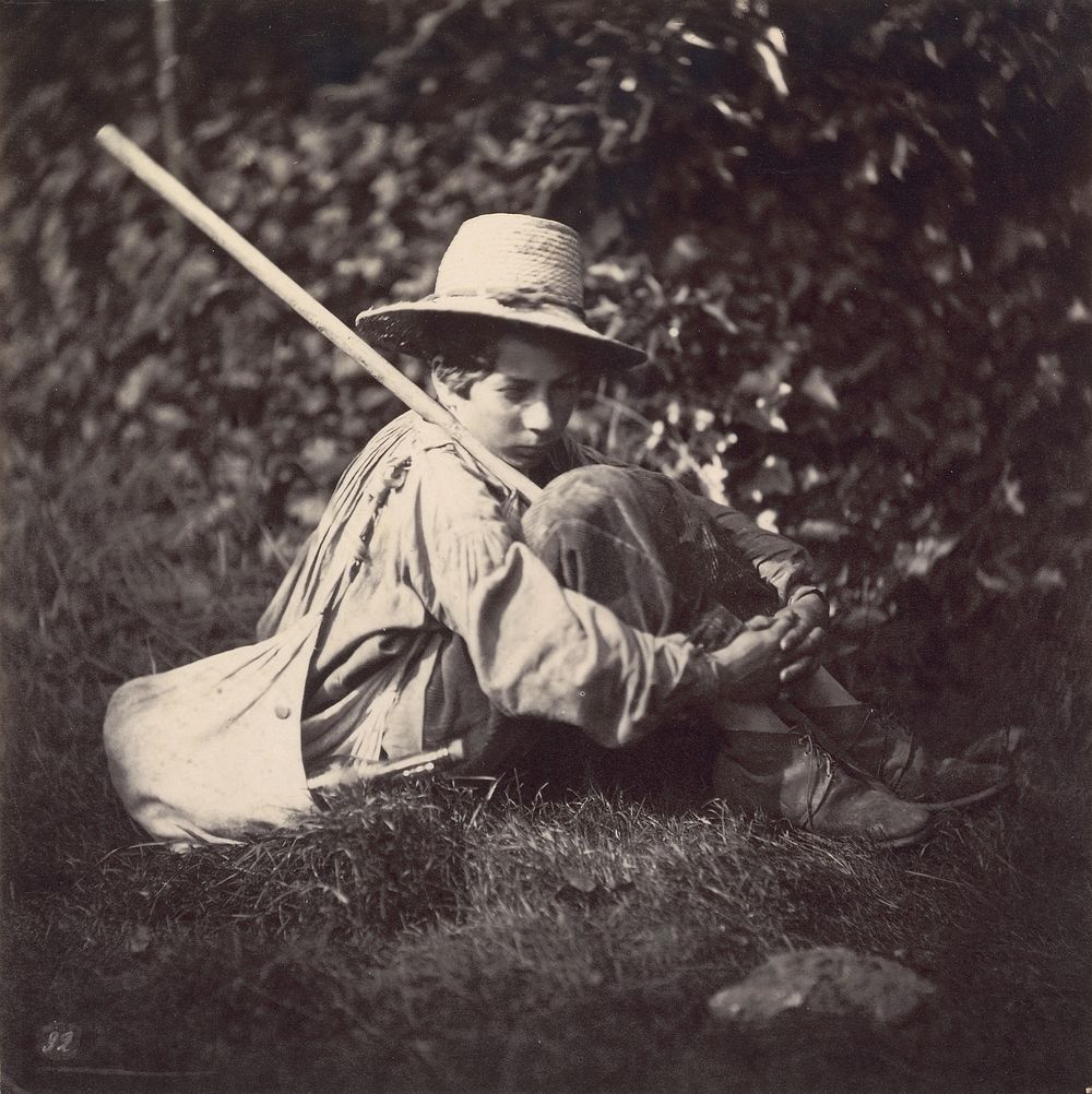 Seated Boy with a Bag and Stick over His Shoulder
