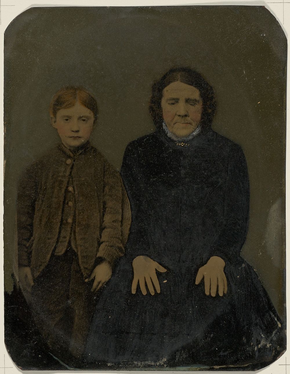 Portrait of old woman and boy