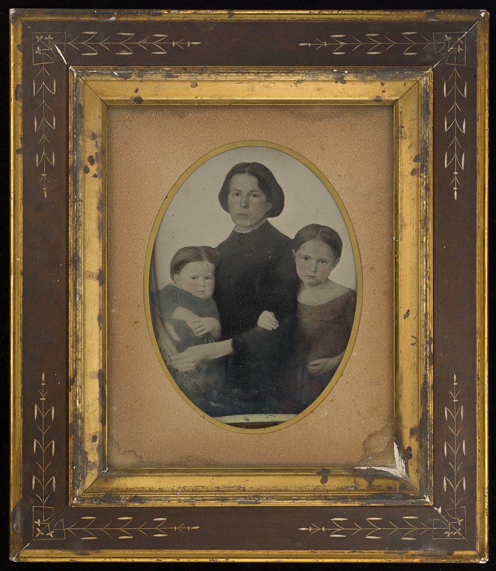 Portrait of mother and two children