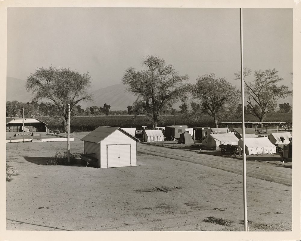 View of Kern migrant camp, community center at left. California by Dorothea Lange
