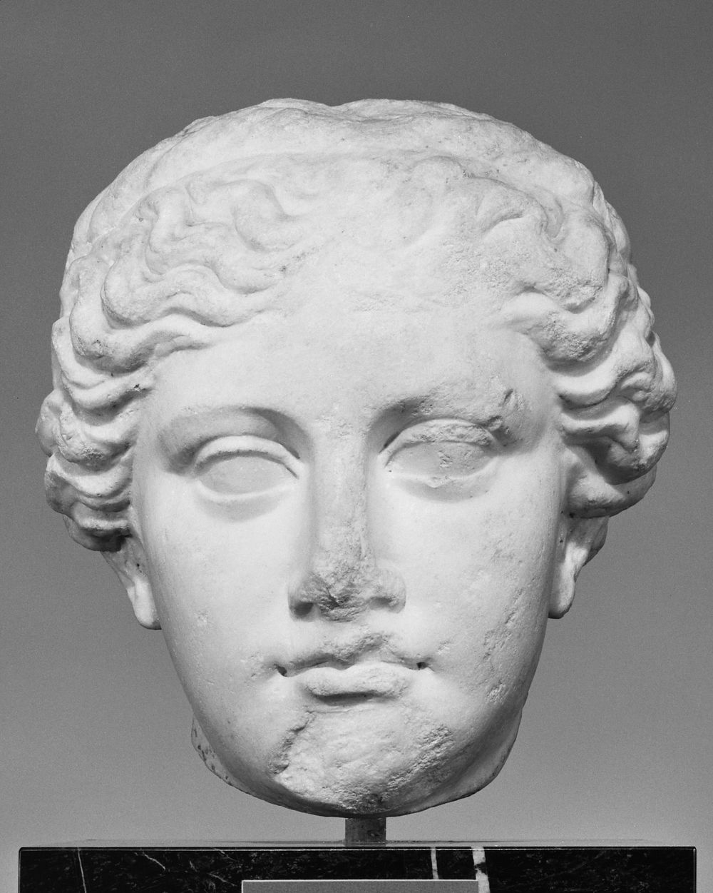 Head of a Statue of a Woman