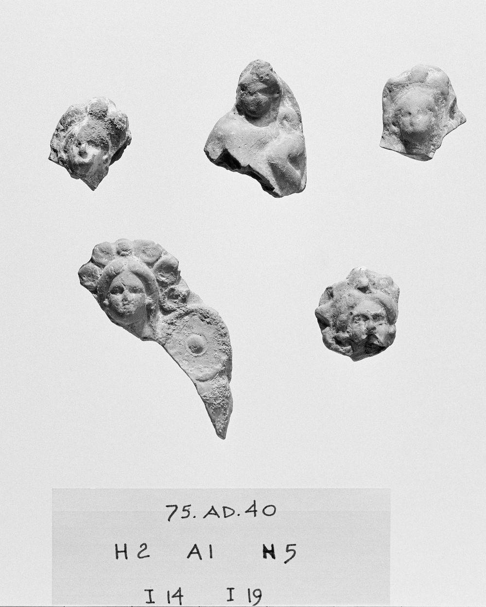 Group of Fragmentary Votive Heads (94)