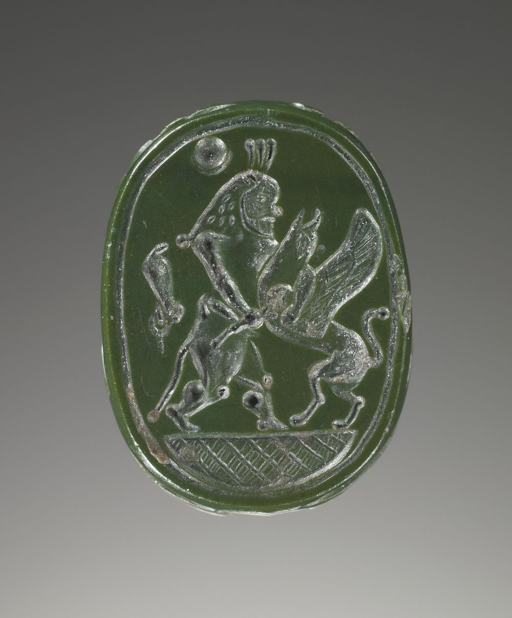 Engraved Scarab with Bes Fighting a Griffin