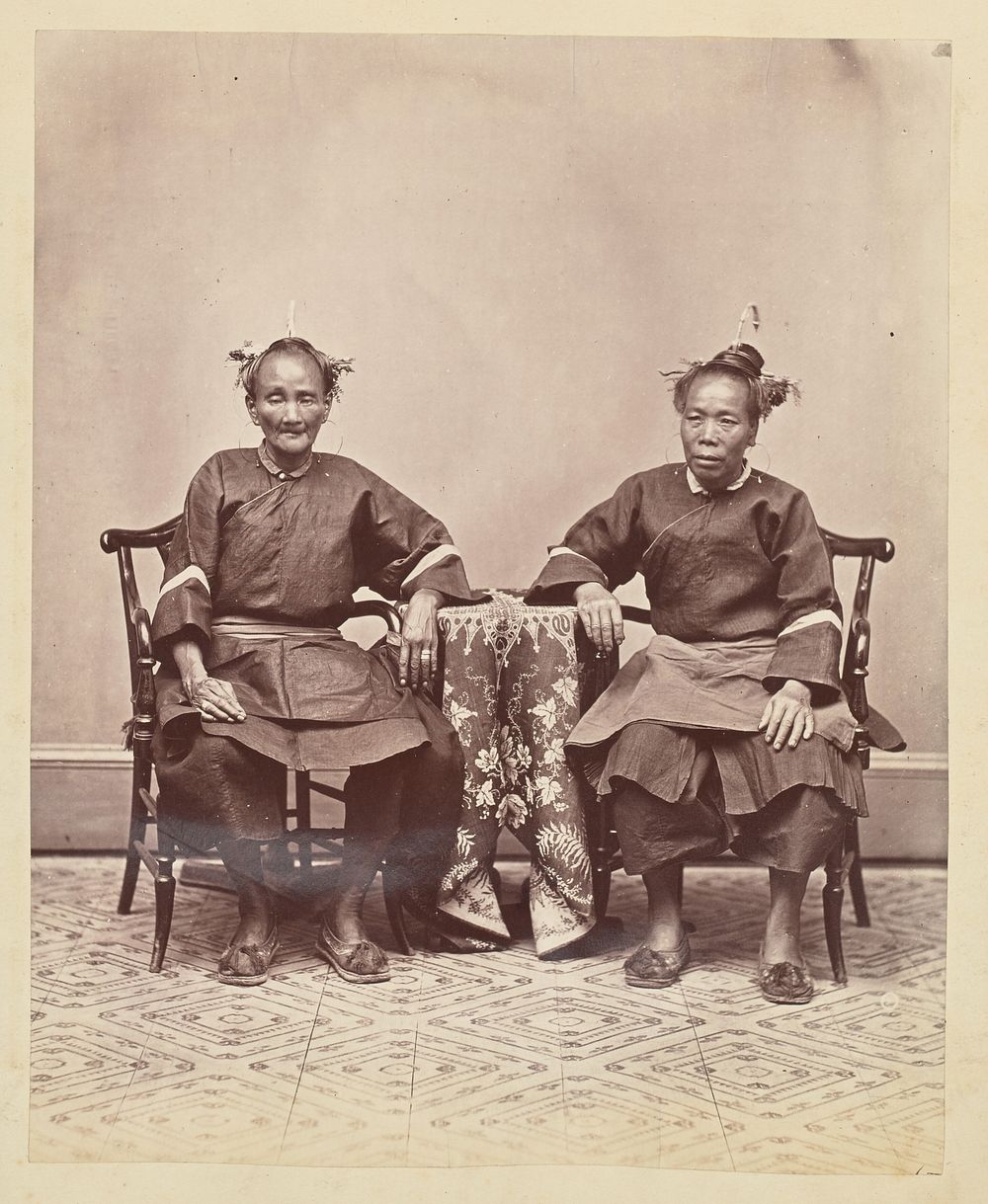 A studio portrait of two seated field Foochow women by W P Floyd