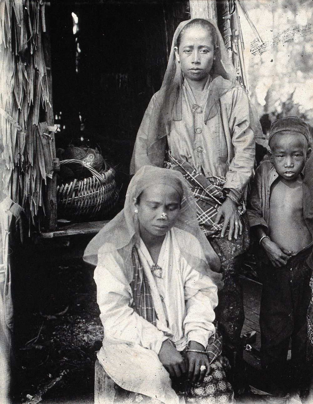 Sarawak: two Malay women and a child. Photograph.