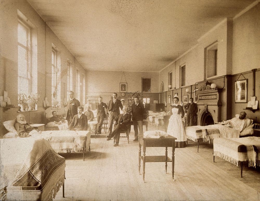 Baron Lister (seated centre) in the Victoria male casulty ward, King's College Hospital. Photograph, 1891.