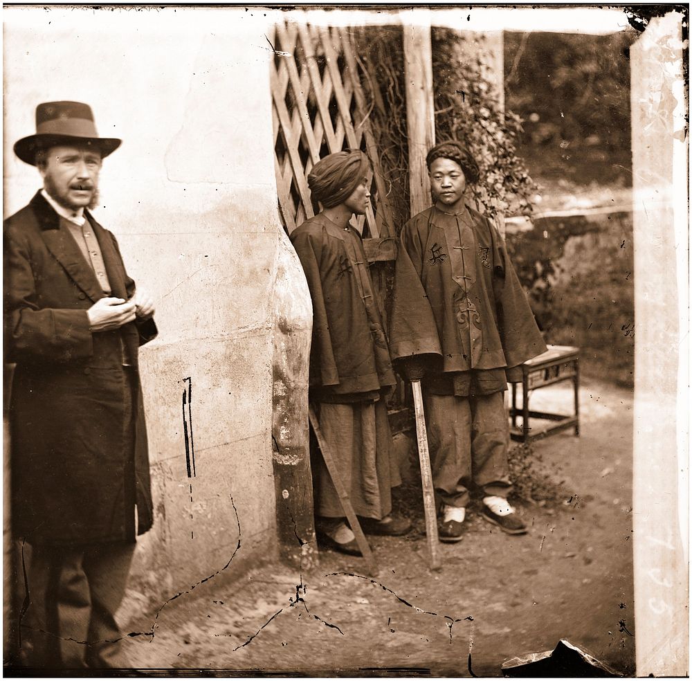 Amoy, Fukien province, China: two Manchu soldiers with John Thomson. Photograph by John Thomson, 1871.