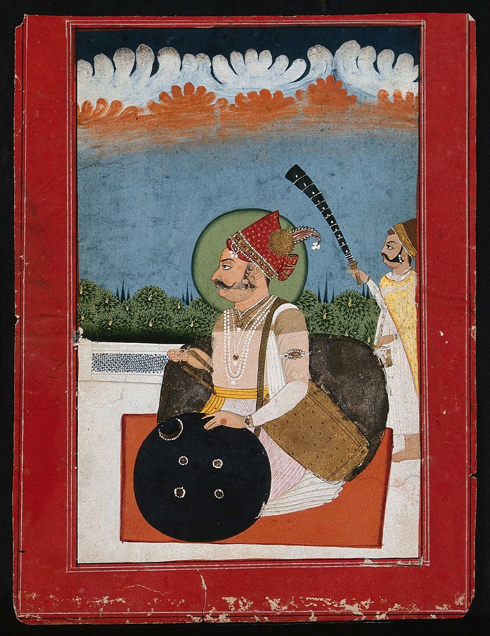 A Rajput Maharaja with an attendant standing behind. Gouache painting by an Indian painter.