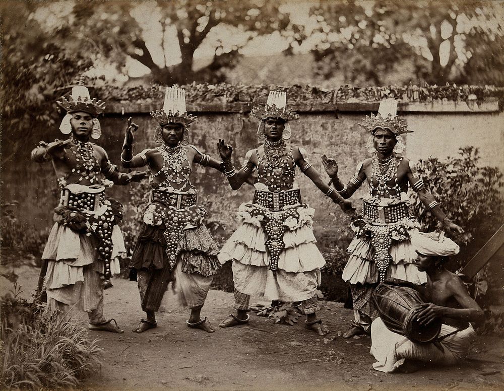 Sri Lanka: traditional 'devil dancers' in costume. Photograph, ca. 1860.