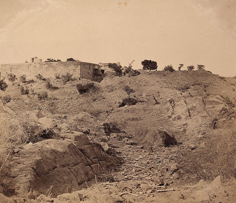India: the ruins of Sammy House surrounded by scattered bones of sepoys killed in action. Photograph by F. Beato, c. 1858.