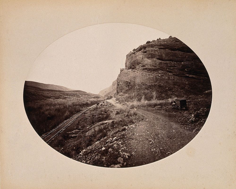 A Central Pacific railway track running through an area called Red Rock (Nevada). Photograph, ca. 1880.