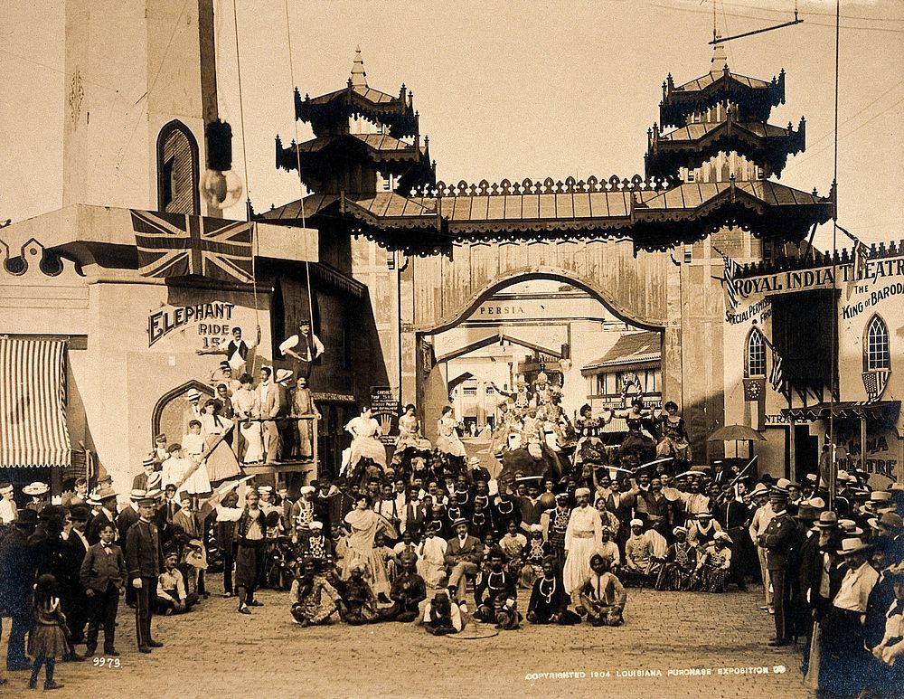 The 1904 World's Fair, St. Louis, Missouri: the Pike (an avenue of amusements): costumed performers, including men and women…