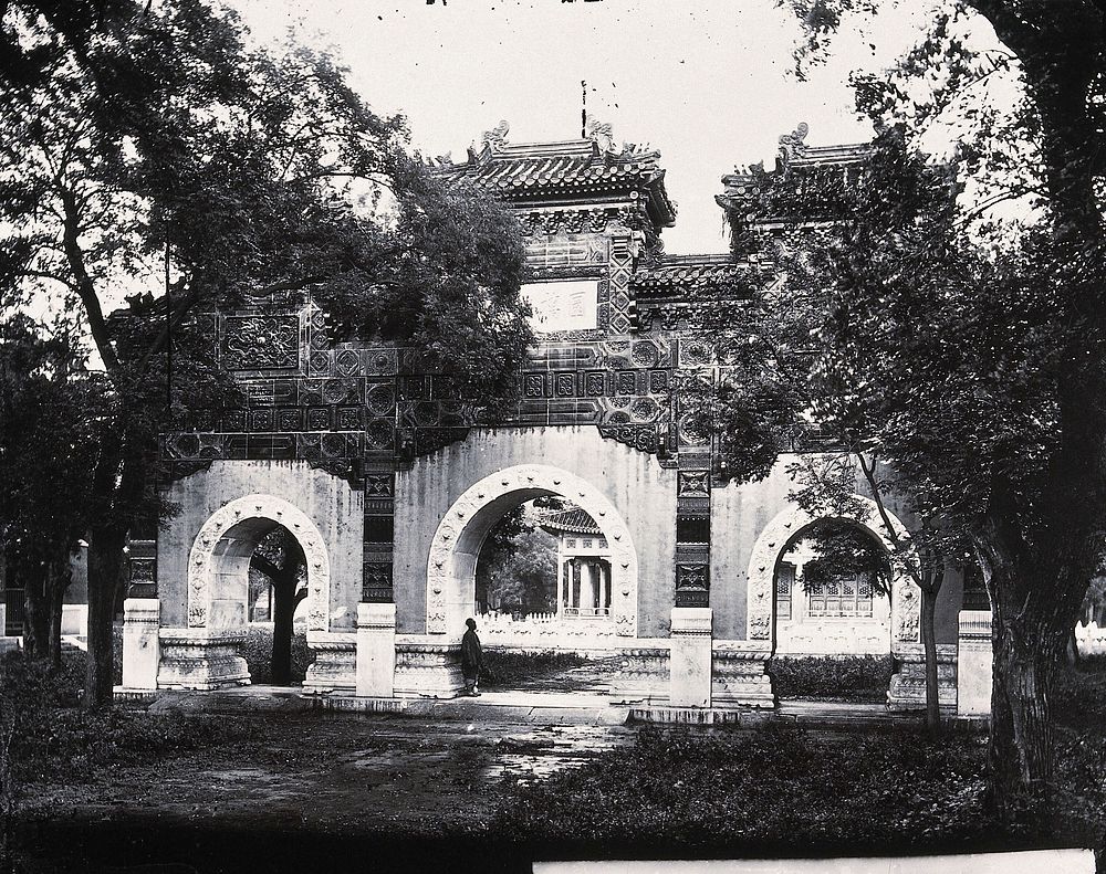 Hall of Classics (Guozijian), Peking: a triple archway of sculpted marble leading to the hall. Photograph, 1981, from a…