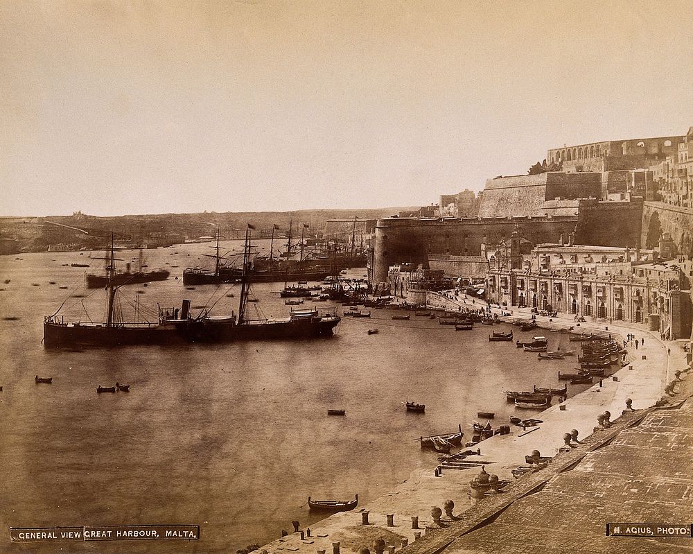 Malta: view of Grand Harbour and buildings along Barriera wharf towards Fort Lascaris and Upper Barrakka. Photograph by H.…