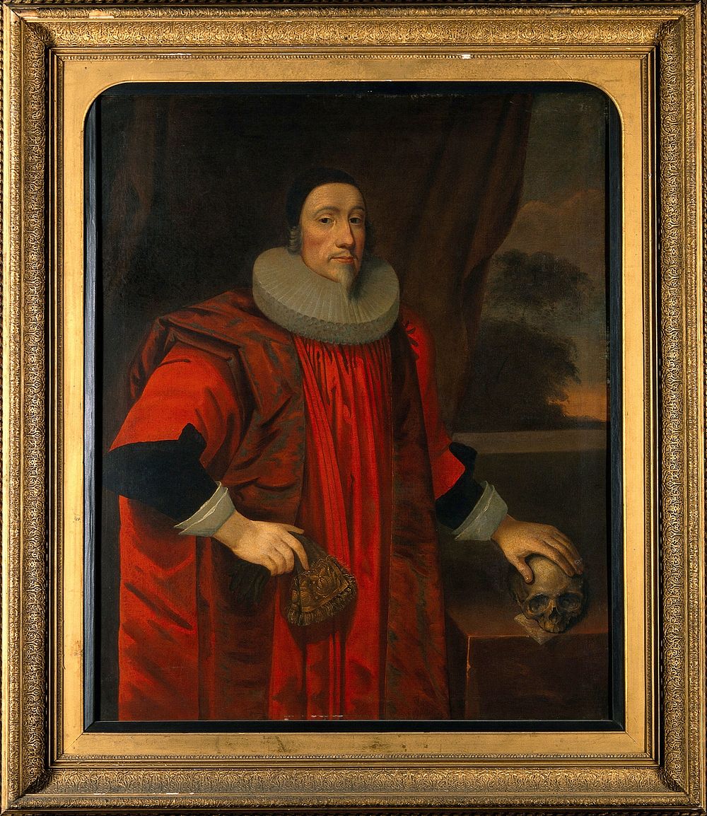 A man holding a skull. Oil painting.