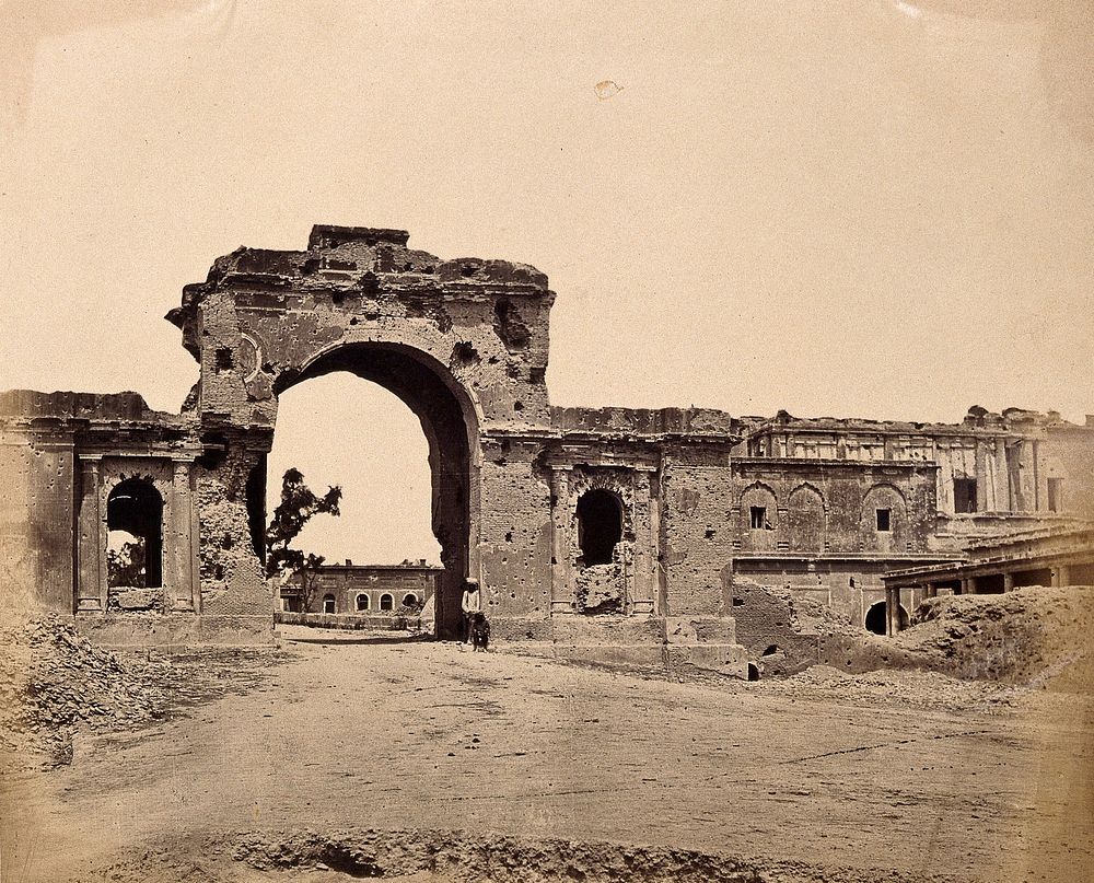 Lucknow, India: gateway of the Lucknow Residency, showing damage caused during the Indian Rebellion. Photograph by Felice…