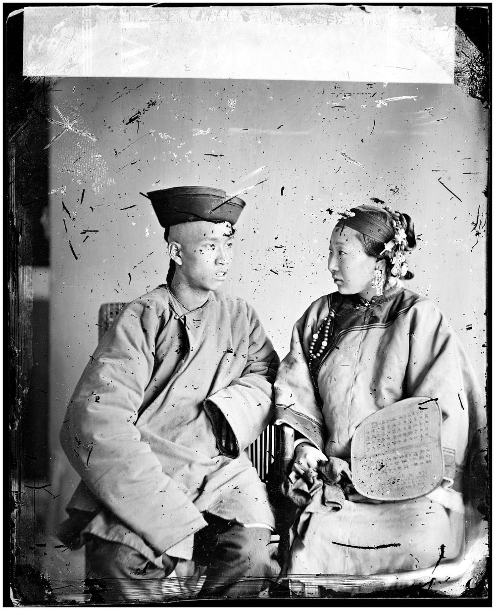 Amoy (Xiamen), Fujian province, China: a husband and wife. Photograph by John Thomson, 1870-1871.