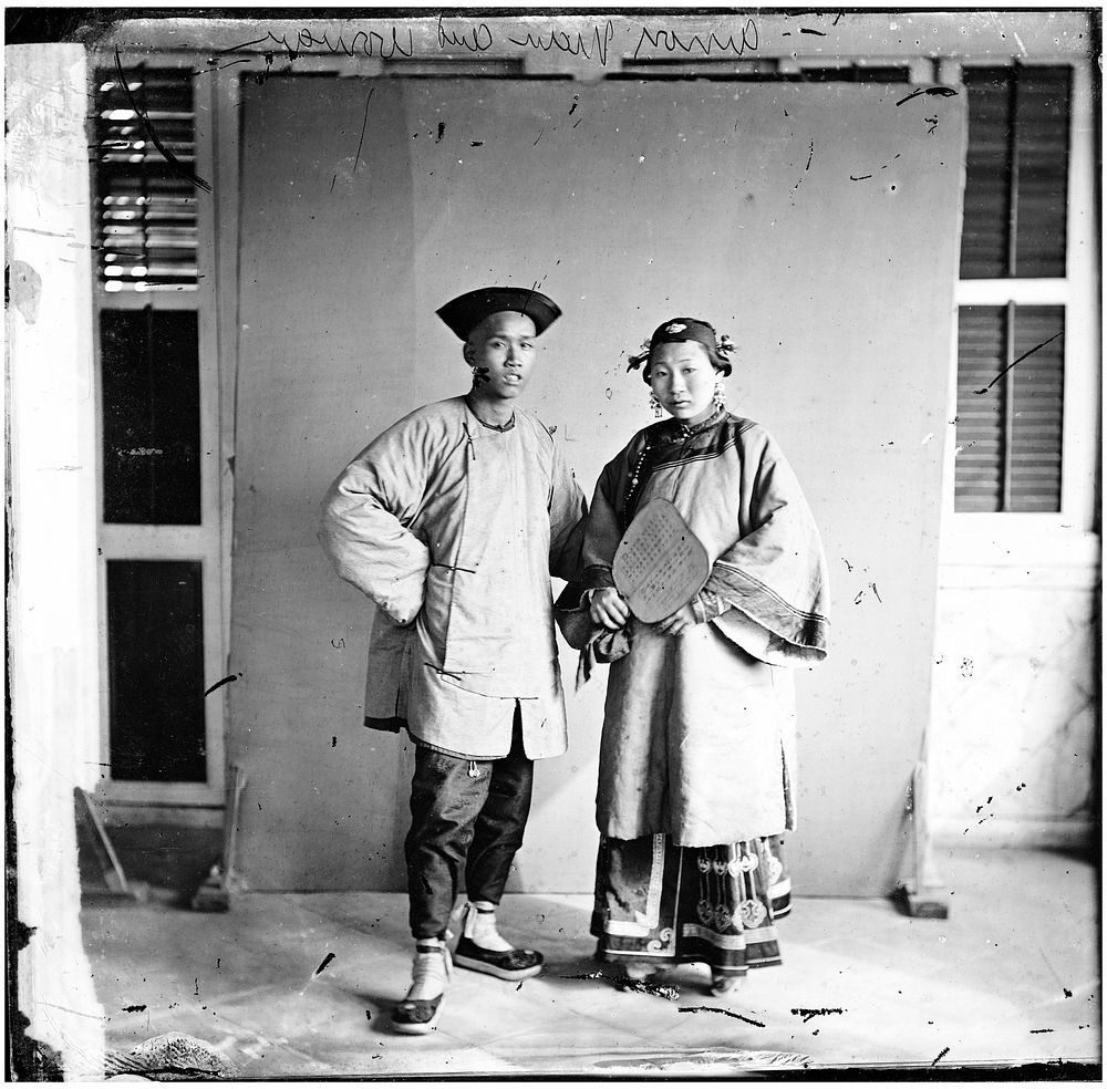 Amoy, Fukien province, China: a married couple, standing. Photograph by John Thomson, 1870.