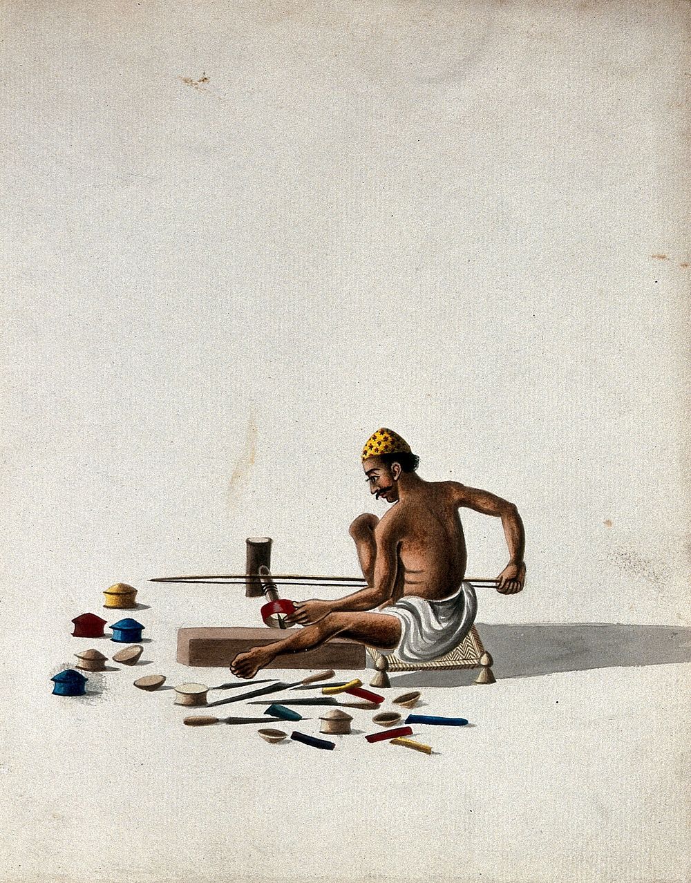 A man making small wooden objects (boxes). Gouache painting by an Indian artist.