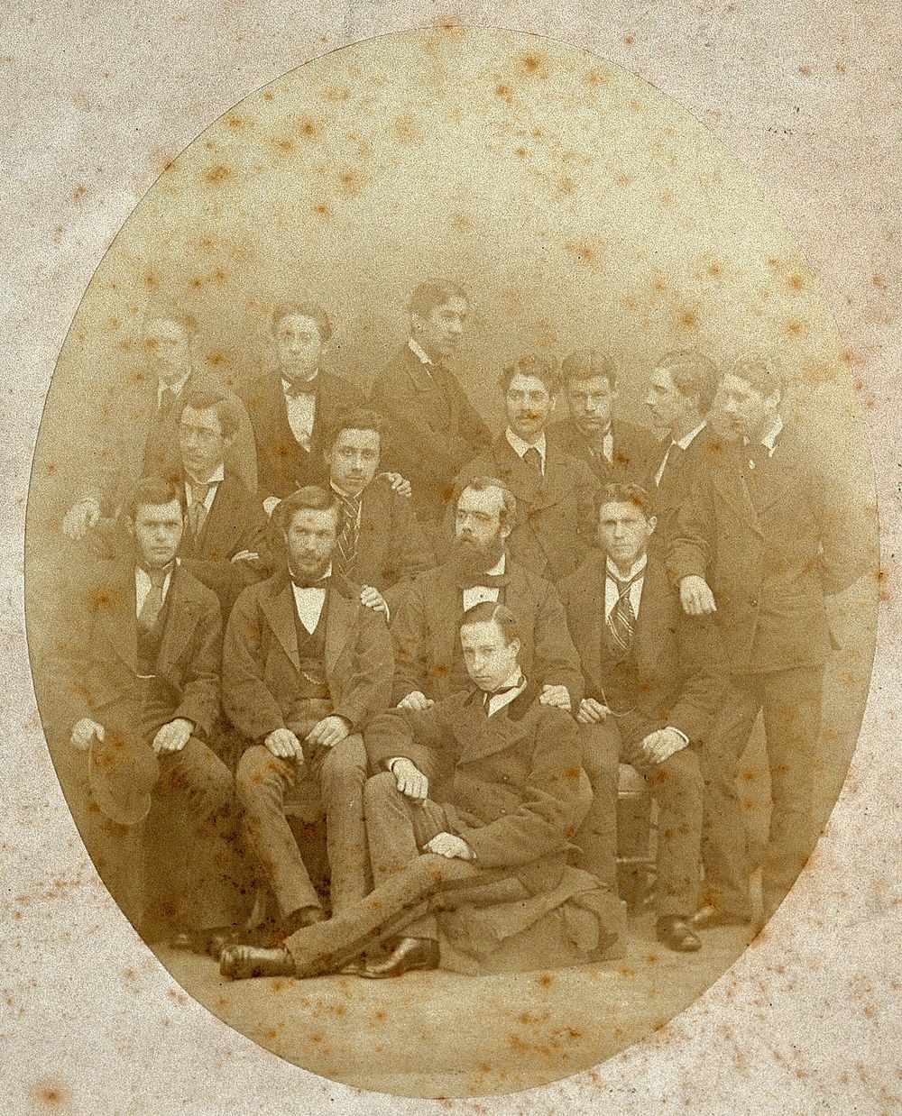John  Bishop (seated centre with beard ), a surgeon, with his staff (of Edinburgh Royal Infirmary ). Photograph, 1870.