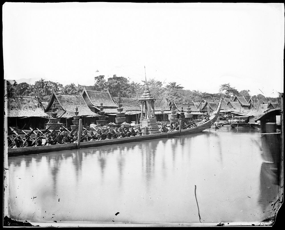 Bangkok, Siam (Thailand): the royal barge on the river for the procession to the Kathin ceremony, 14 October 1865.…