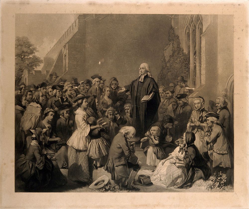 John Wesley preaching outside a church. Engraving.