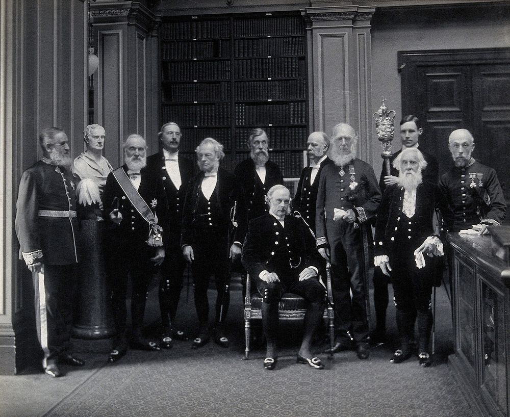 Fellows of the Royal Society: Sir John Evans, bust of Sir Isaac Newton, Lord Kelvin, R.B. Clifton, G.G. Stokes, Sir Michael…
